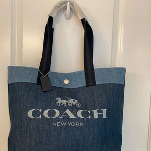 NWT large COACH Horse and Carriage logo denim tote bag.
